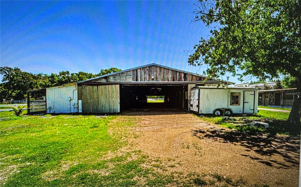 10502 Henderson Road Tampa, FL 33625 - Photo 9 of 16 a front view of a house with a yard