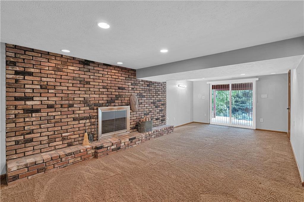 122 Fulton Road Canonsburg, PA 15317 - Photo 19 of 25 a view of an empty room with a fireplace