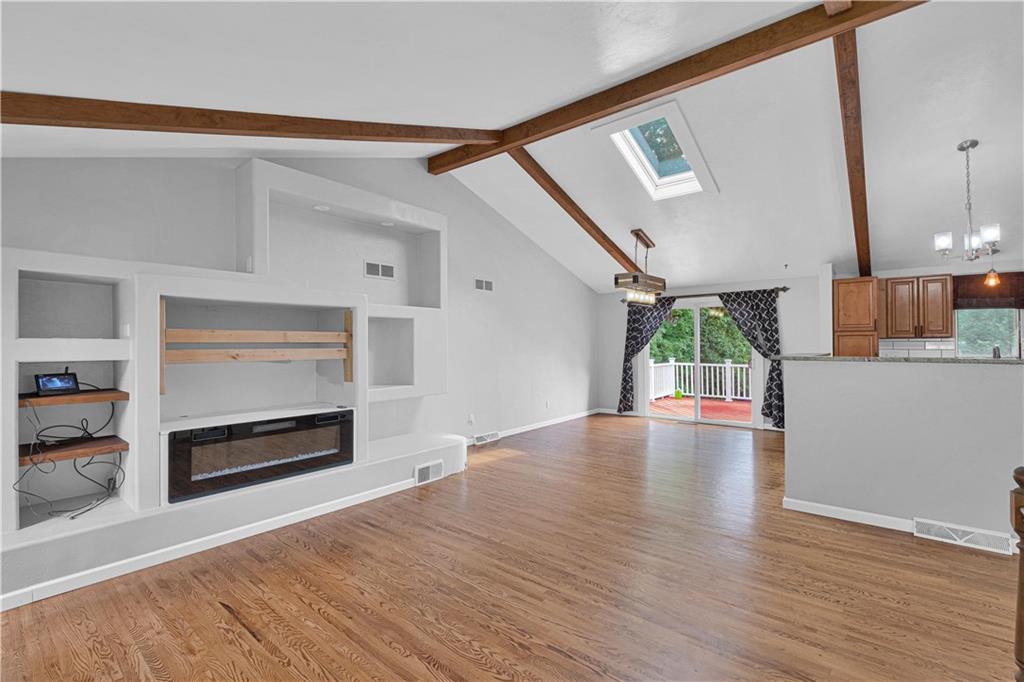 122 Fulton Road Canonsburg, PA 15317 - Photo 5 of 25 a view of an empty room and wooden floor