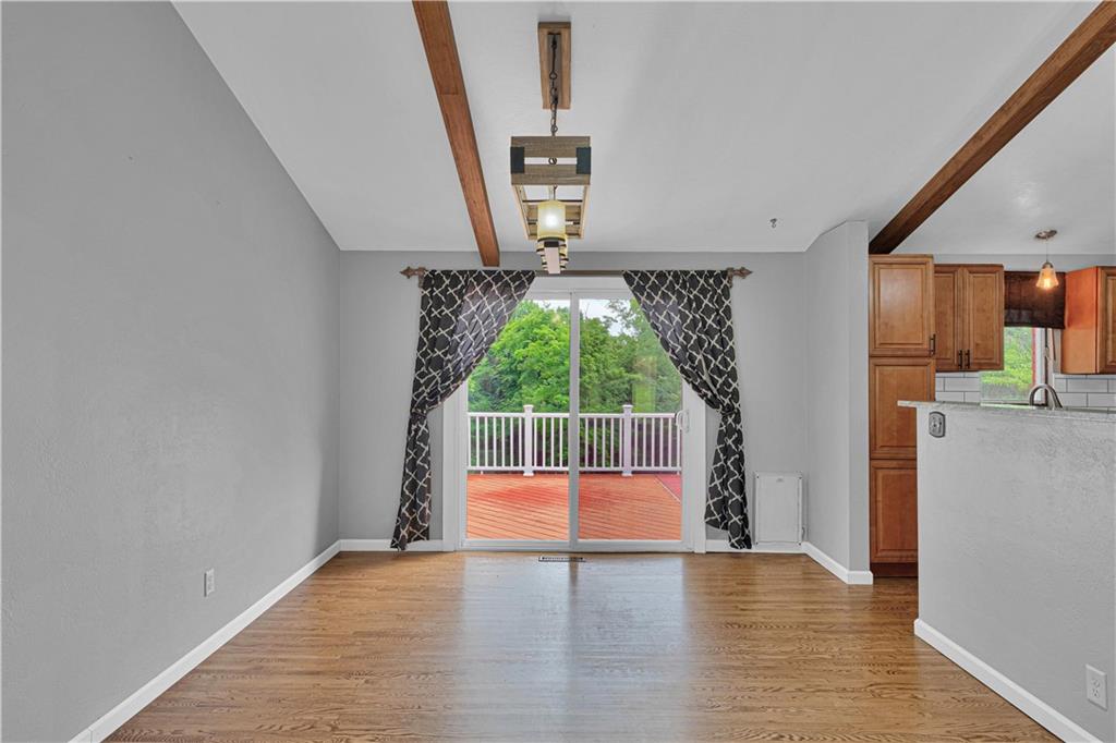 122 Fulton Road Canonsburg, PA 15317 - Photo 7 of 25 a view of empty room with wooden floor and fan