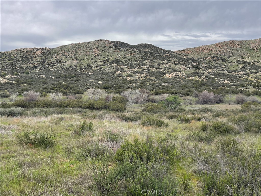 25 Los Altos Hemet, CA 92544 - Photo 16 of 16 a view of a mountain range in a cloudy sky