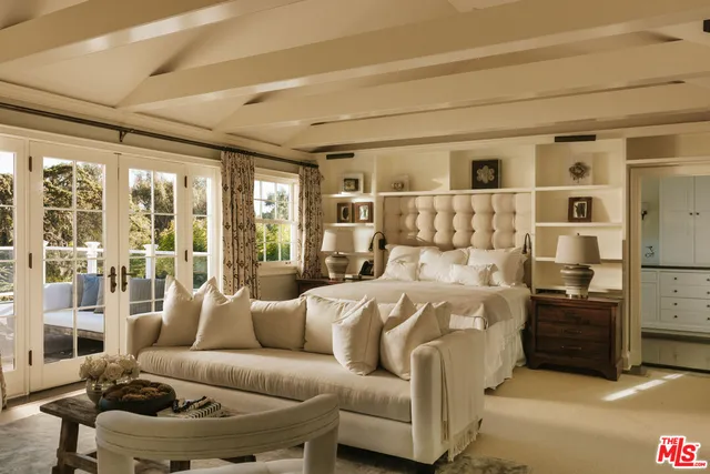 a bed room with a bed and a couch