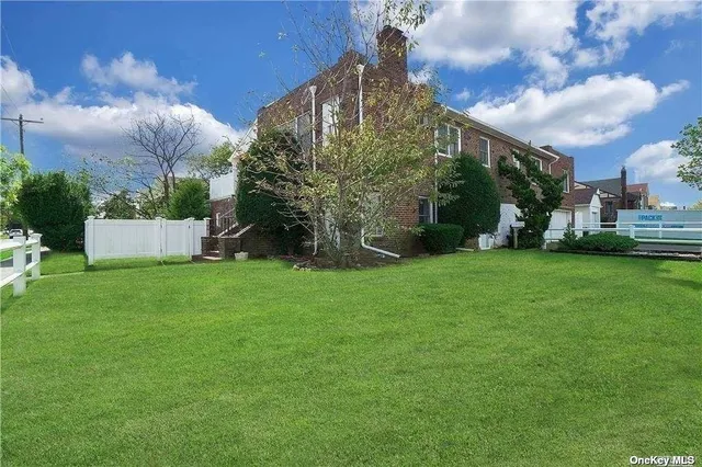 a view of a back yard of the house