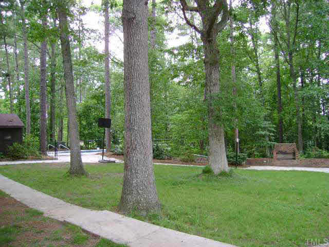 1208 Deboy Street Raleigh, NC 27606 - Photo 5 of 7 View of backyard that feels like a small park. Other