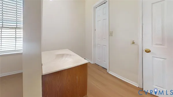 a workspace with furniture and rug