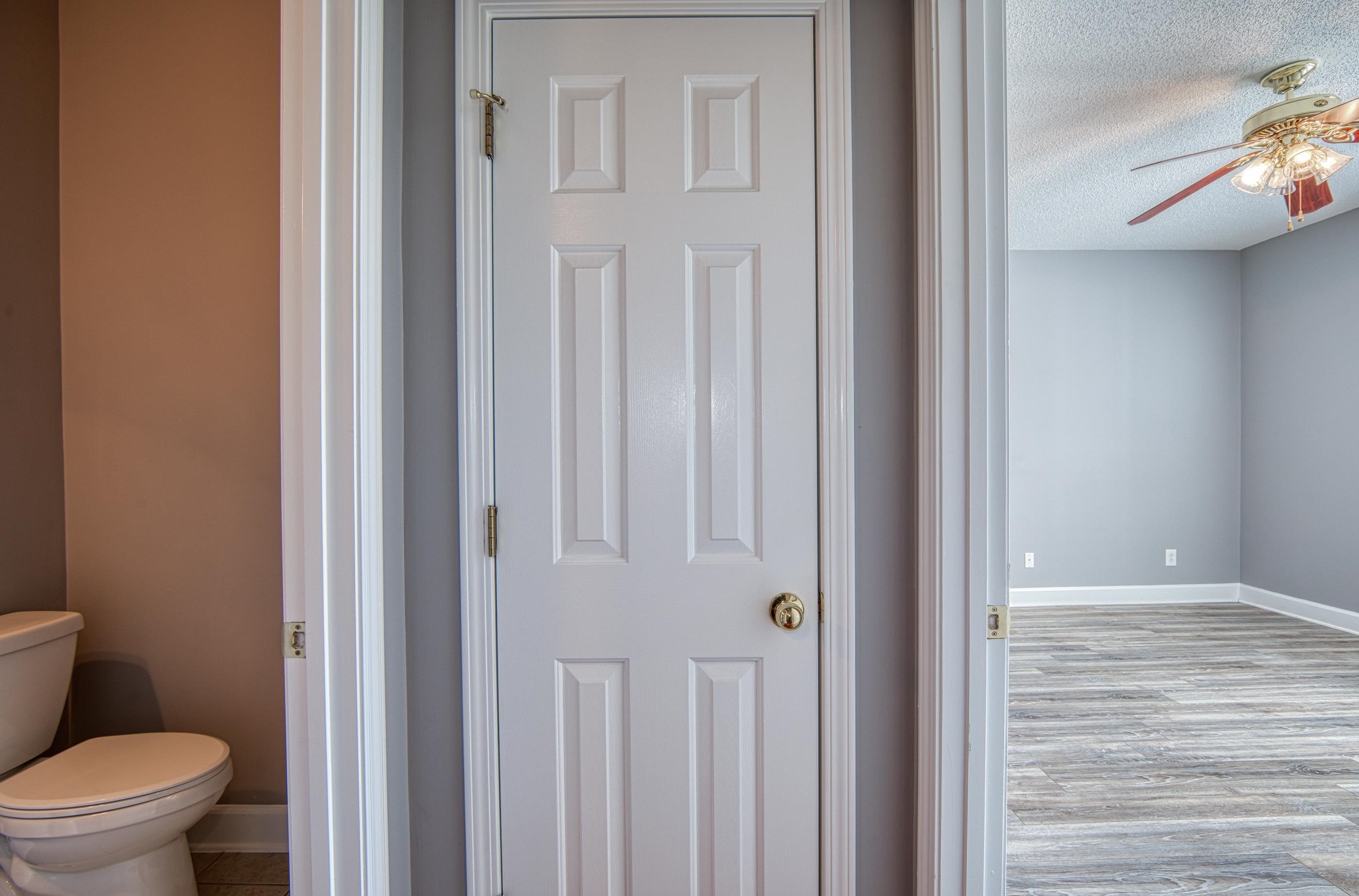 205 Threshing Way, Unit 1050 Myrtle Beach, SC 29579 - Photo 14 of 40 Bathroom featuring a textured ceiling, ceiling fan, and wood finished floors