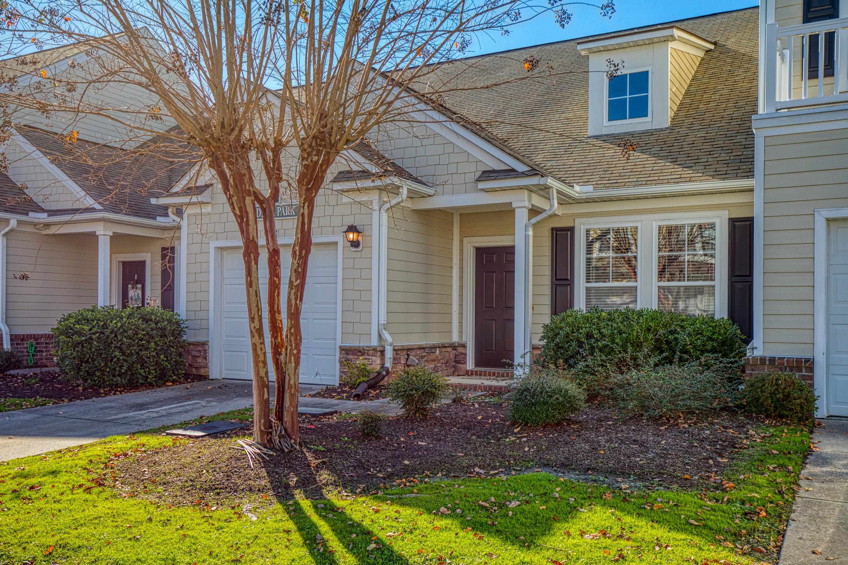 205 Threshing Way, Unit 1050 Myrtle Beach, SC 29579 - Photo 2 of 40 View of front facade with a shingled roof, driveway, and an attached garage