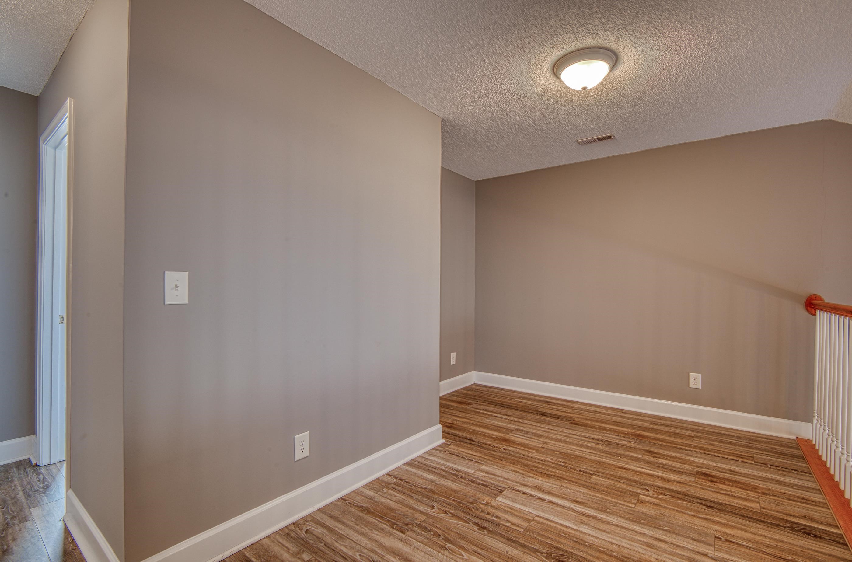 205 Threshing Way, Unit 1050 Myrtle Beach, SC 29579 - Photo 23 of 40 Unfurnished room with a textured ceiling and light wood finished floors