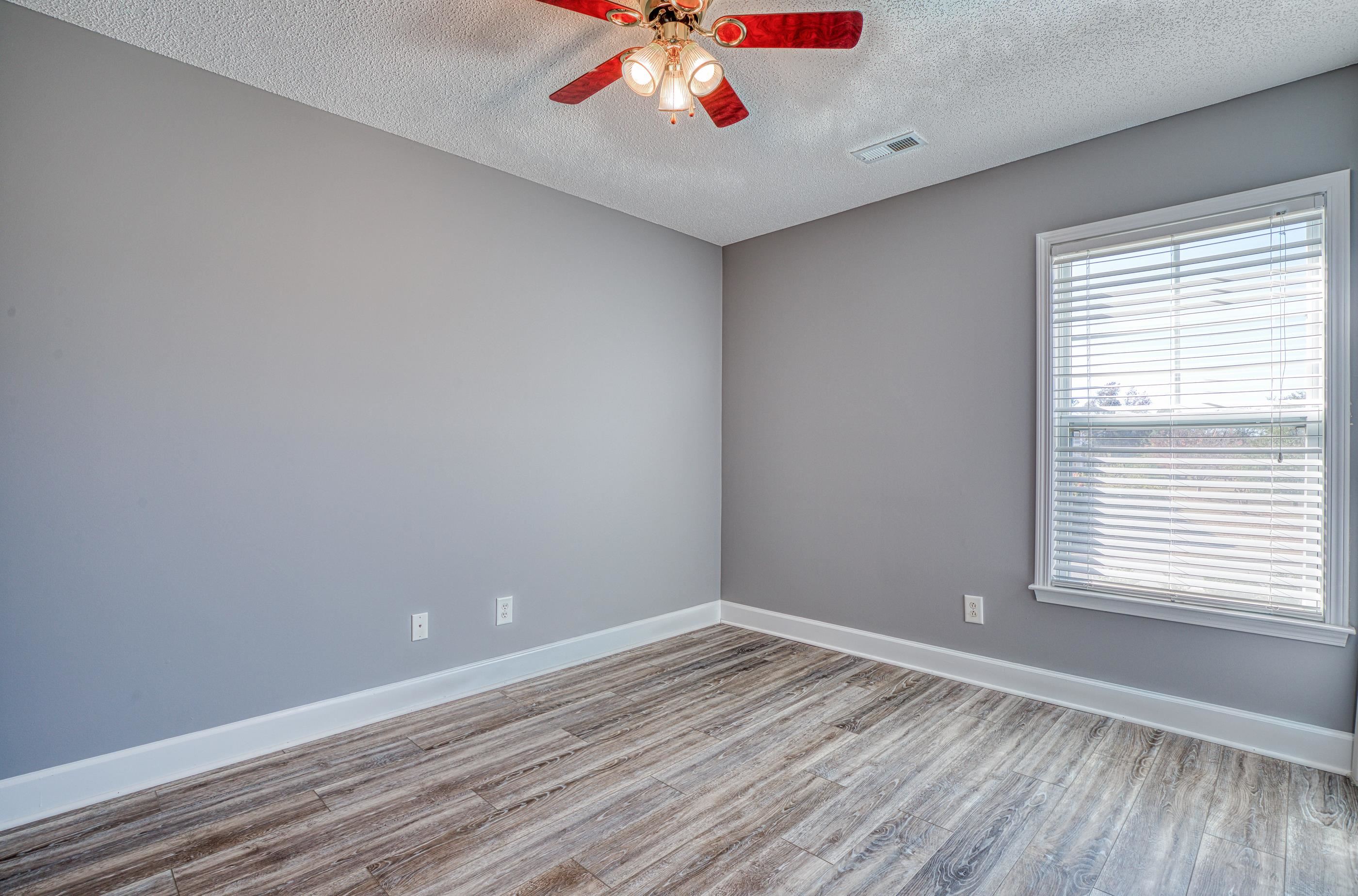 205 Threshing Way, Unit 1050 Myrtle Beach, SC 29579 - Photo 31 of 40 Spare room with light wood finished floors, a textured ceiling, and ceiling fan