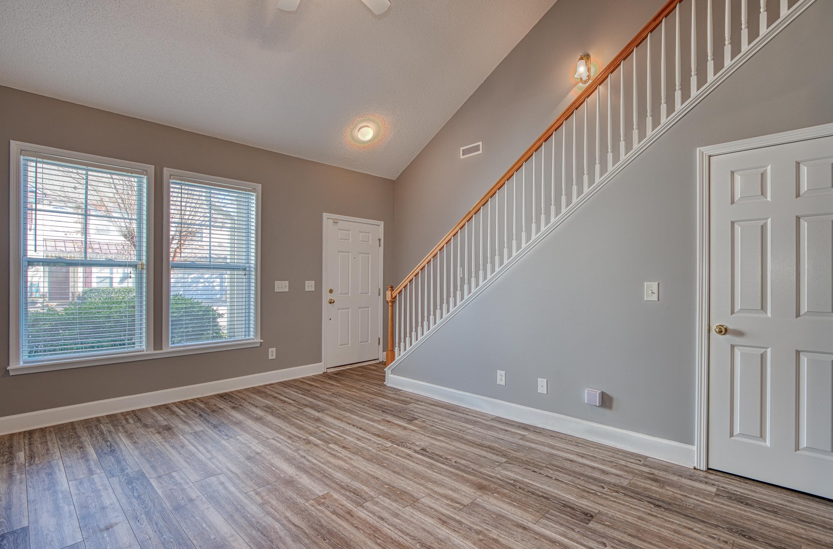 205 Threshing Way, Unit 1050 Myrtle Beach, SC 29579 - Photo 6 of 40 Entryway featuring light wood-type flooring, stairs, high vaulted ceiling, and ceiling fan