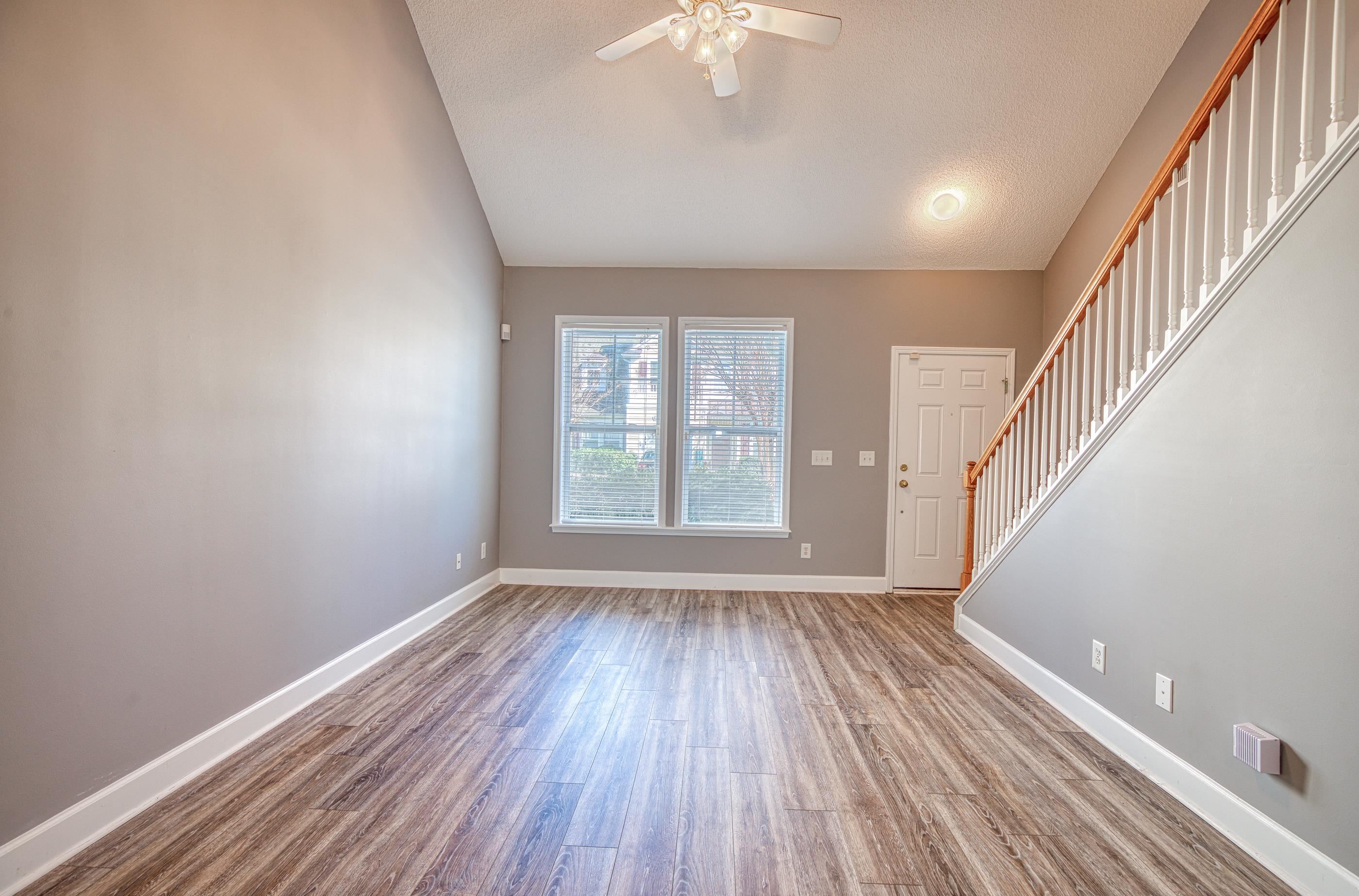 205 Threshing Way, Unit 1050 Myrtle Beach, SC 29579 - Photo 7 of 40 Entryway featuring light wood-style floors, stairway, vaulted ceiling, and ceiling fan