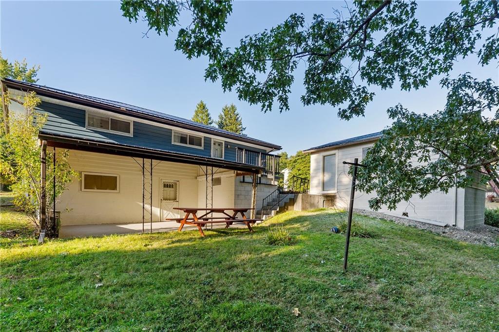 2085 Debrakeleer Avenue Farrell, PA 16121 - Photo 4 of 17 a front view of a house with a yard