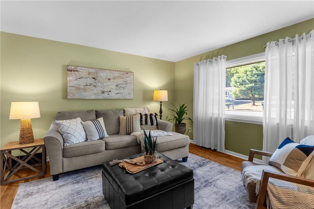 2085 Debrakeleer Avenue Farrell, PA 16121 - Photo 7 of 17 a living room with furniture and a window
