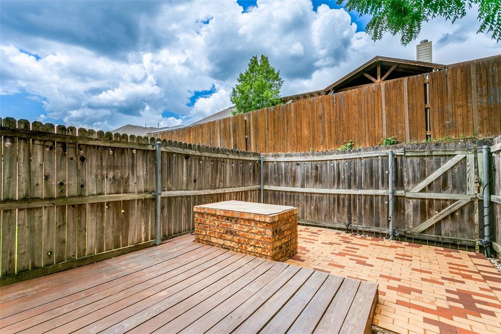 17 Abbey Road Euless, TX 76039 - Photo 19 of 23 Deck showing fire pit