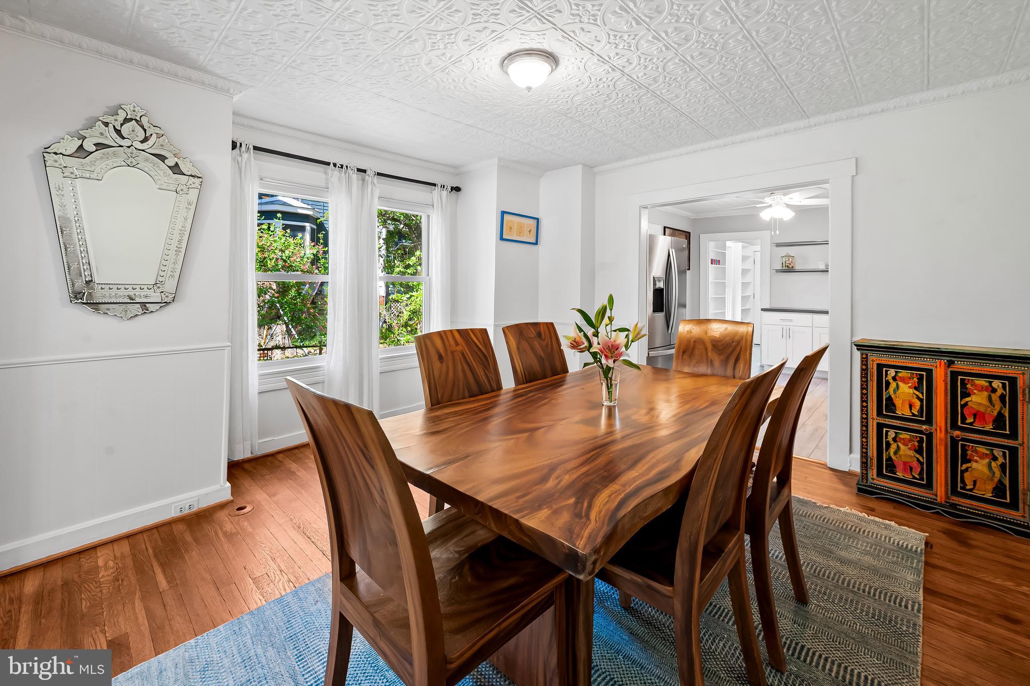 4605 Schenley Road Baltimore, MD 21210 - Photo 11 of 44 a dining room with furniture and window