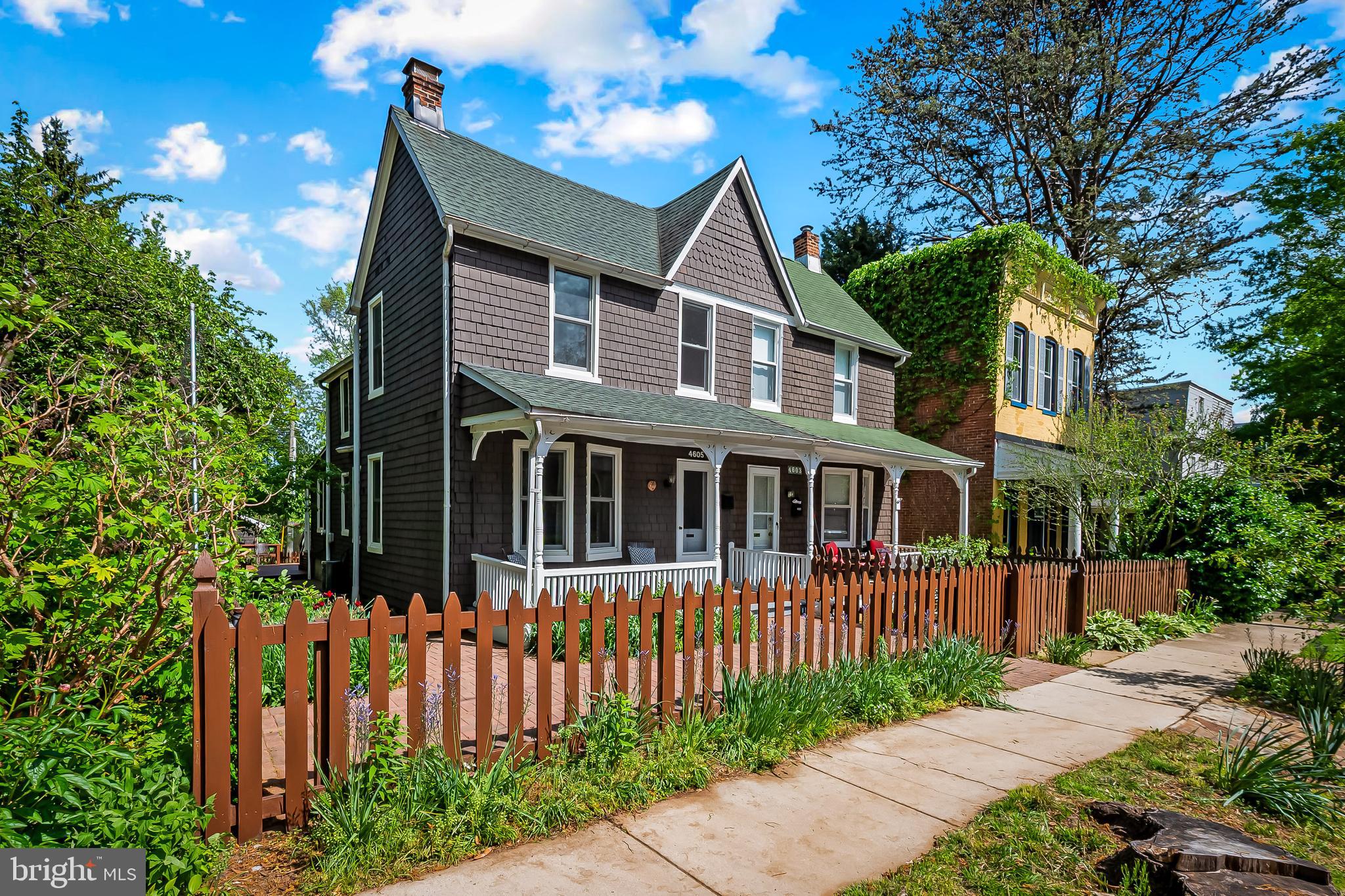 4605 Schenley Road Baltimore, MD 21210 - Photo 2 of 44 a front view of a house with a garden