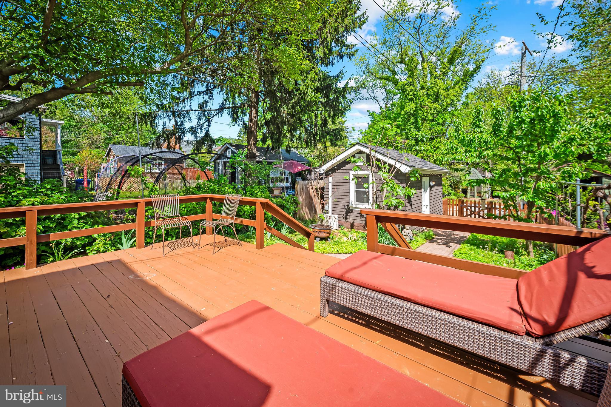 4605 Schenley Road Baltimore, MD 21210 - Photo 34 of 44 a view of a roof deck with wooden floor and fence