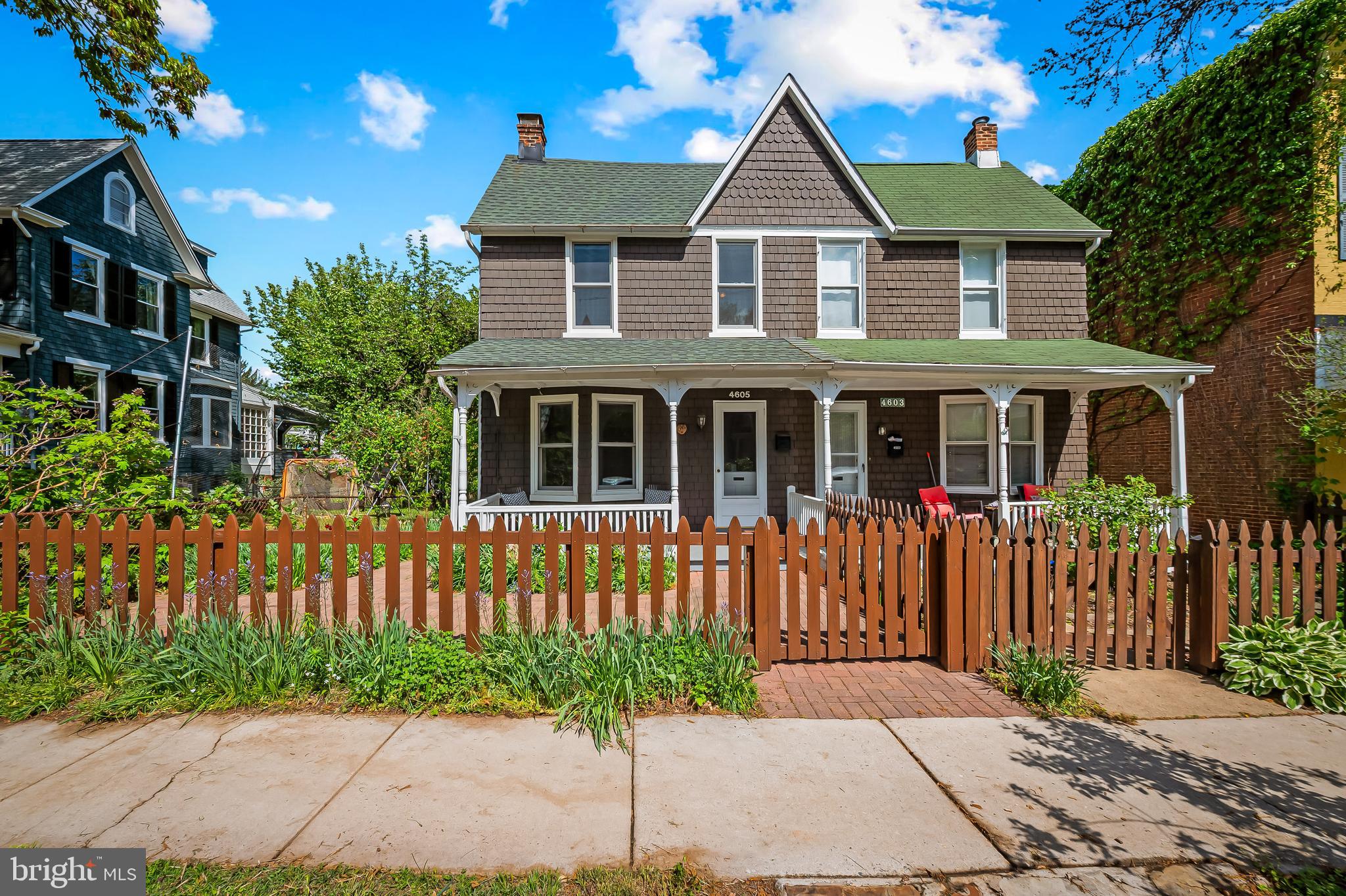 4605 Schenley Road Baltimore, MD 21210 - Photo 4 of 44 a front view of a house with a garden