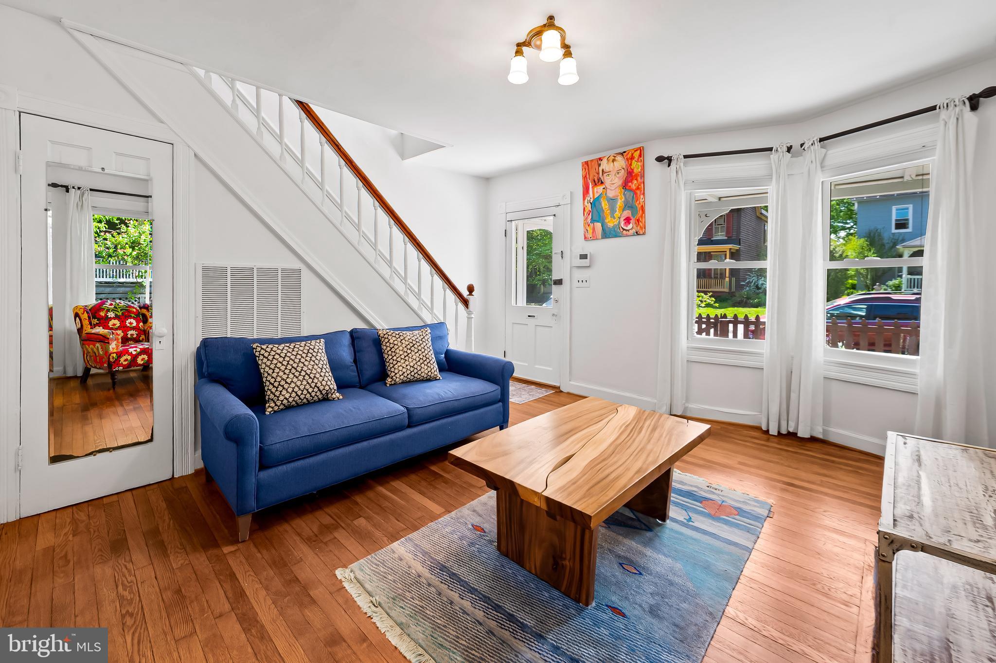 4605 Schenley Road Baltimore, MD 21210 - Photo 7 of 44 a living room with furniture and a wooden floor