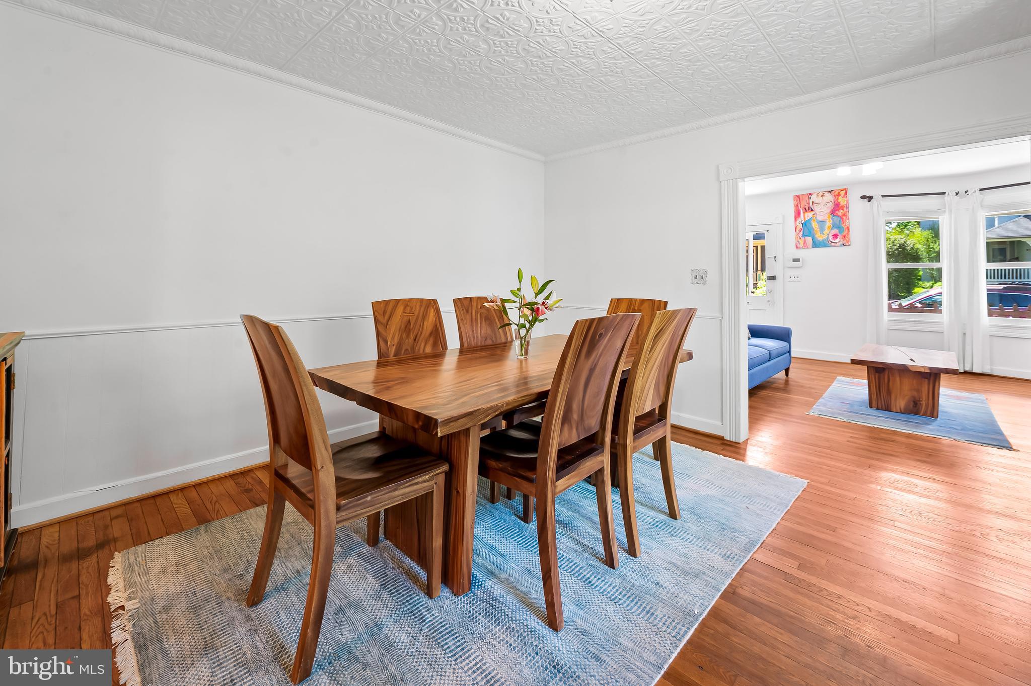 4605 Schenley Road Baltimore, MD 21210 - Photo 10 of 44 a view of a dining room with furniture and wooden floor