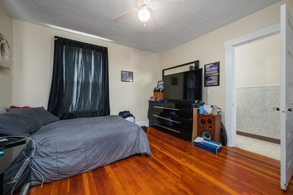 6 Rayner Street Blackstone, MA 01504 - Photo 12 of 33 a bedroom with a bed and a flat screen tv