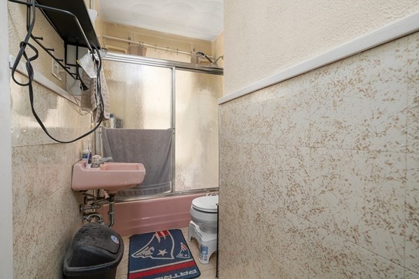 6 Rayner Street Blackstone, MA 01504 - Photo 15 of 33 a bathroom with a sink toilet and a mirror