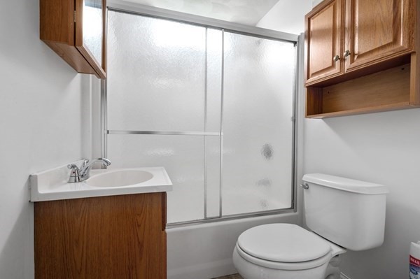 6 Rayner Street Blackstone, MA 01504 - Photo 18 of 33 a bathroom with a sink a toilet and shower