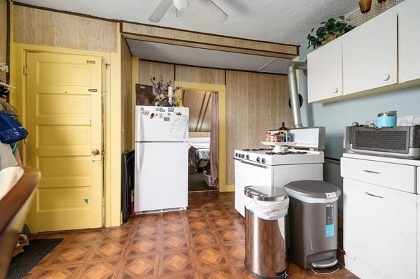 6 Rayner Street Blackstone, MA 01504 - Photo 2 of 33 a kitchen with a refrigerator and cabinets