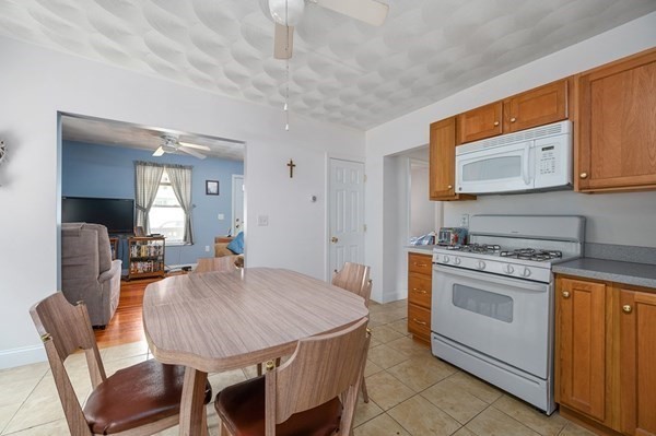 6 Rayner Street Blackstone, MA 01504 - Photo 23 of 33 a view of a dining room with furniture and wooden floor