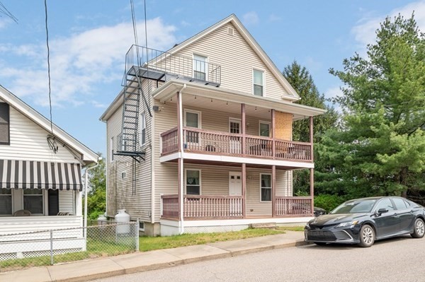 6 Rayner Street Blackstone, MA 01504 - Photo 28 of 33 a view of a car parked in front of a house