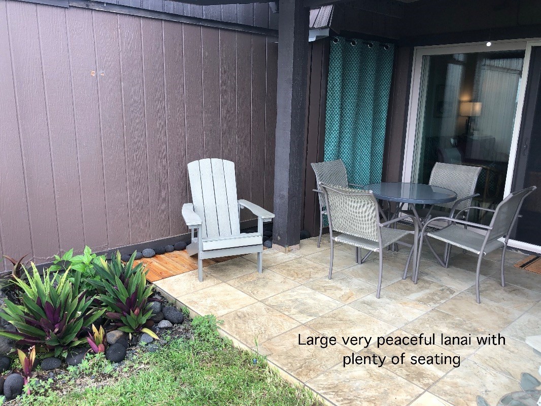 95-788 Ninole Loop Road, Unit 41 Naalehu, HI 96772 - Photo 17 of 19 a view of outdoor space with seating area