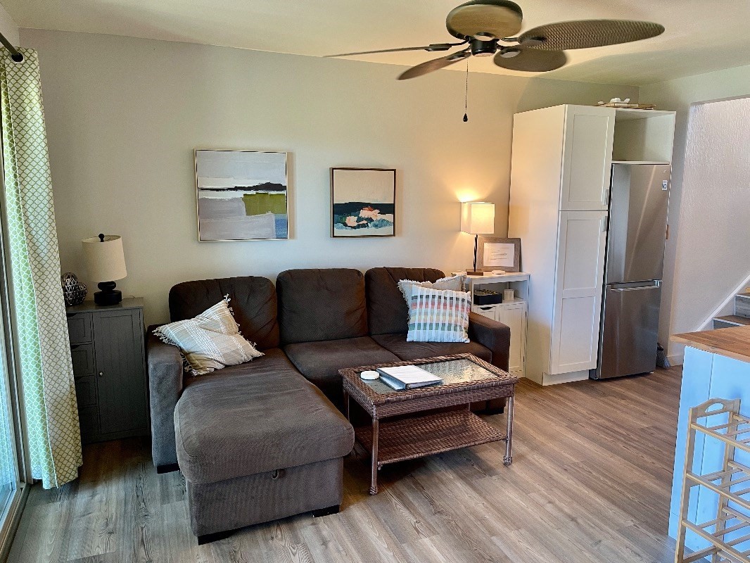 95-788 Ninole Loop Road, Unit 41 Naalehu, HI 96772 - Photo 3 of 19 a living room with furniture and a window