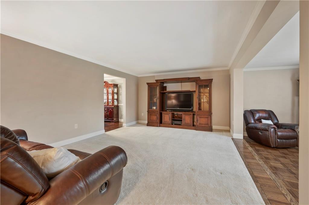 1787 Hassam Road Coraopolis, PA 15108 - Photo 11 of 28 The formal living room is spacious enough for plenty of large furniture.