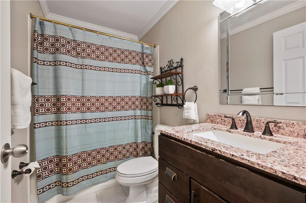 1787 Hassam Road Coraopolis, PA 15108 - Photo 21 of 28 The full bath offers vanity with granite top and tile floors.