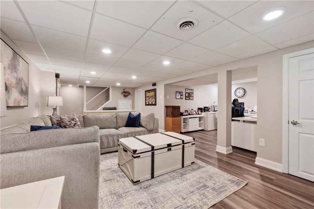 1787 Hassam Road Coraopolis, PA 15108 - Photo 23 of 28 The basement includes a laundry room with half bath and a workshop area.