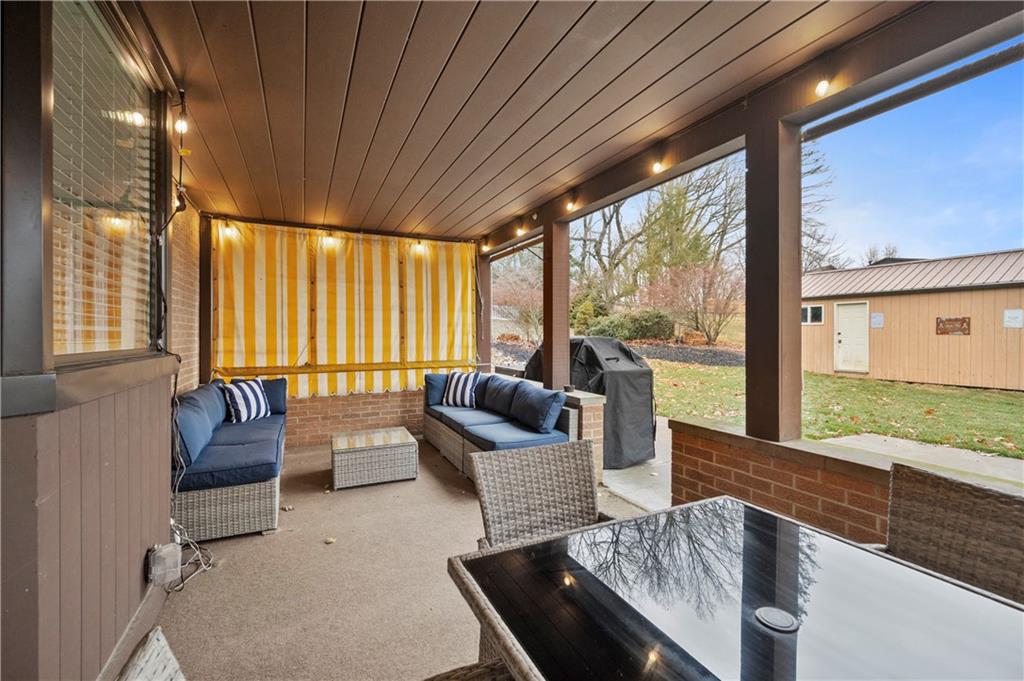 1787 Hassam Road Coraopolis, PA 15108 - Photo 25 of 28 The covered patio is a great space to entertain and enjoy the outdoors.