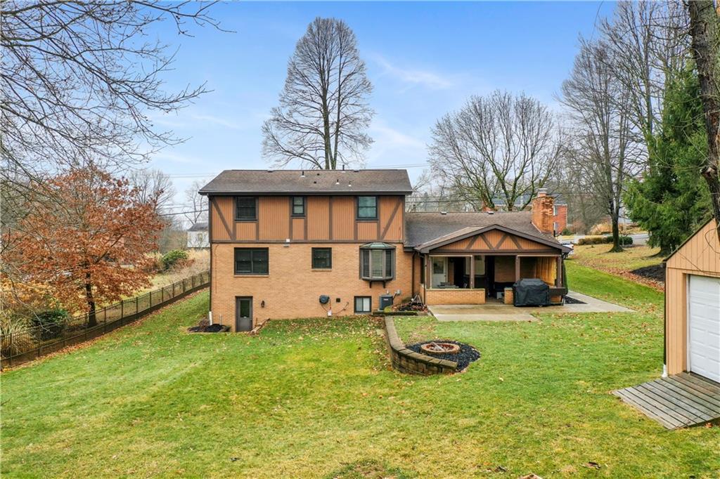 1787 Hassam Road Coraopolis, PA 15108 - Photo 26 of 28 The backyard is nice and flat and includes a firepit area.