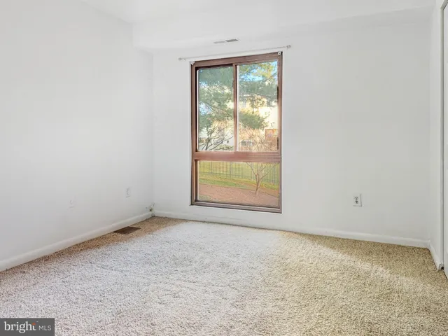 an empty room with a window