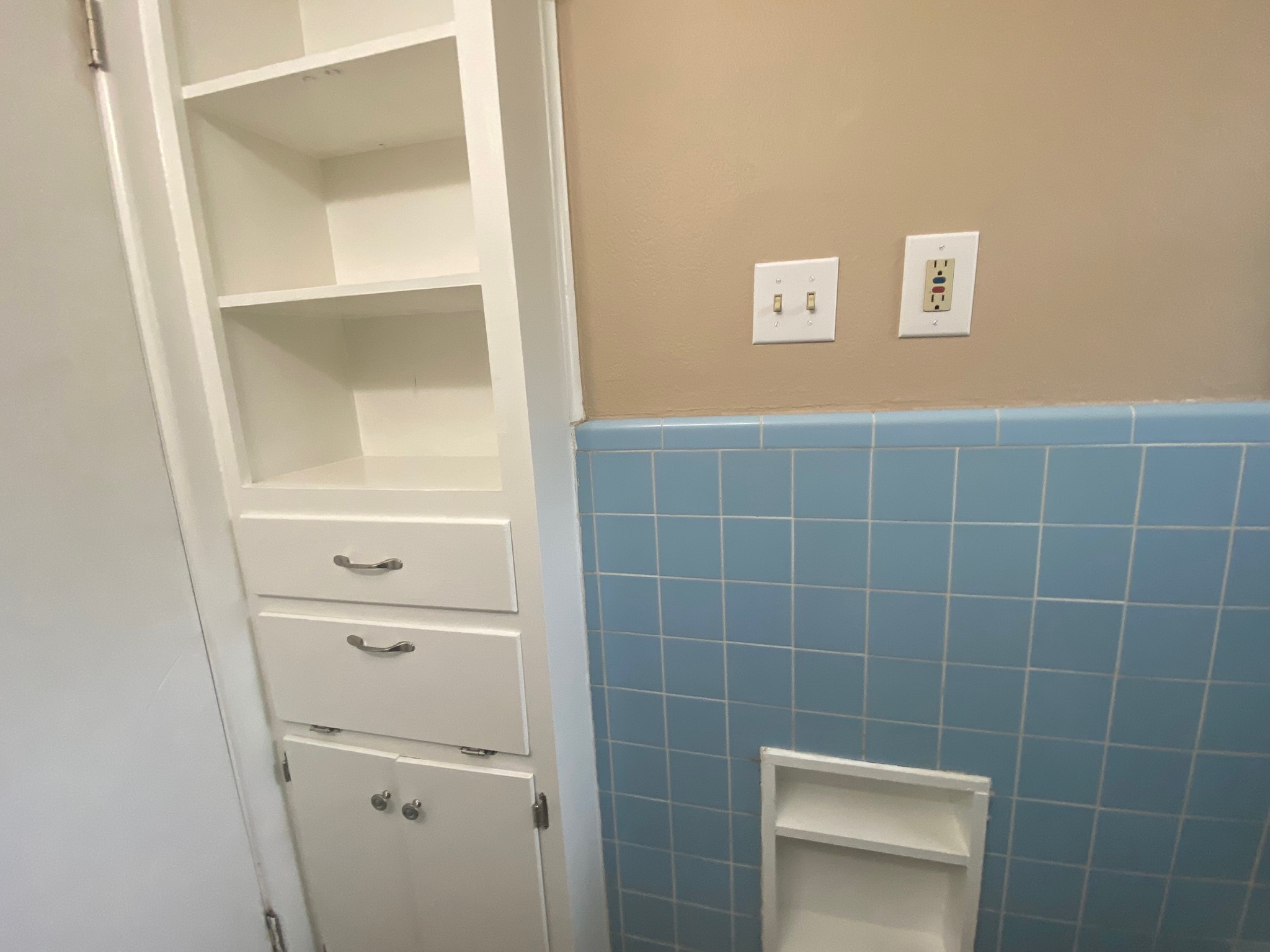 1818 South 39th Street Temple, TX 76504 - Photo 12 of 14 Bathroom with wainscoting and tile walls
