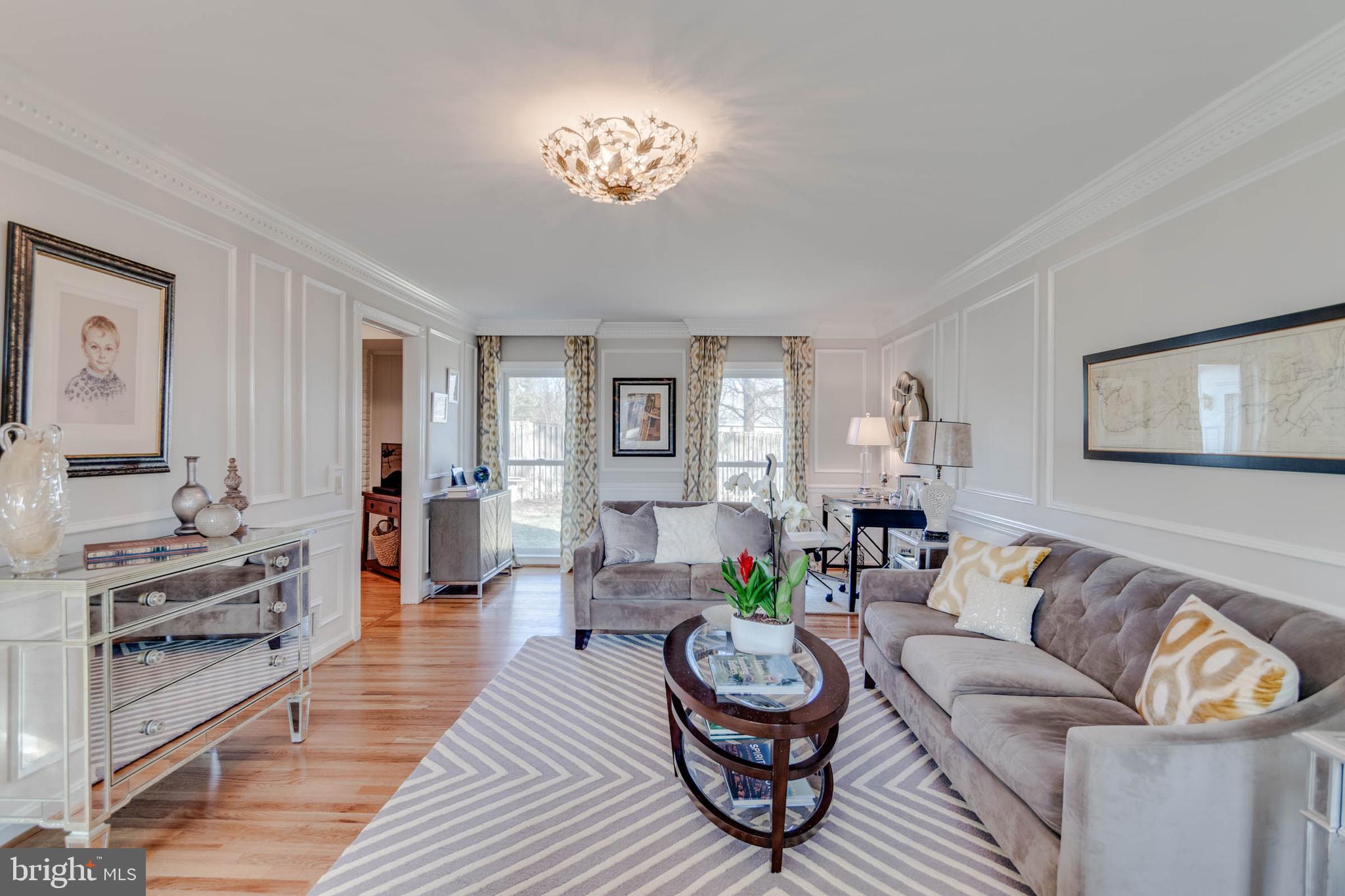 1007 St Stephens Road Alexandria, VA 22304 - Photo 11 of 59 a living room with furniture and a wooden floor