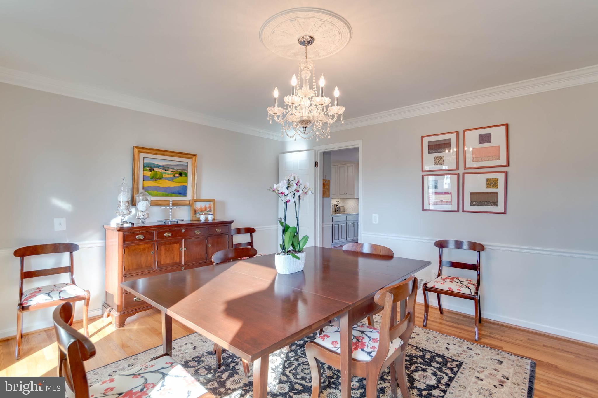 1007 St Stephens Road Alexandria, VA 22304 - Photo 13 of 59 a view of a dining room with furniture and chandelier