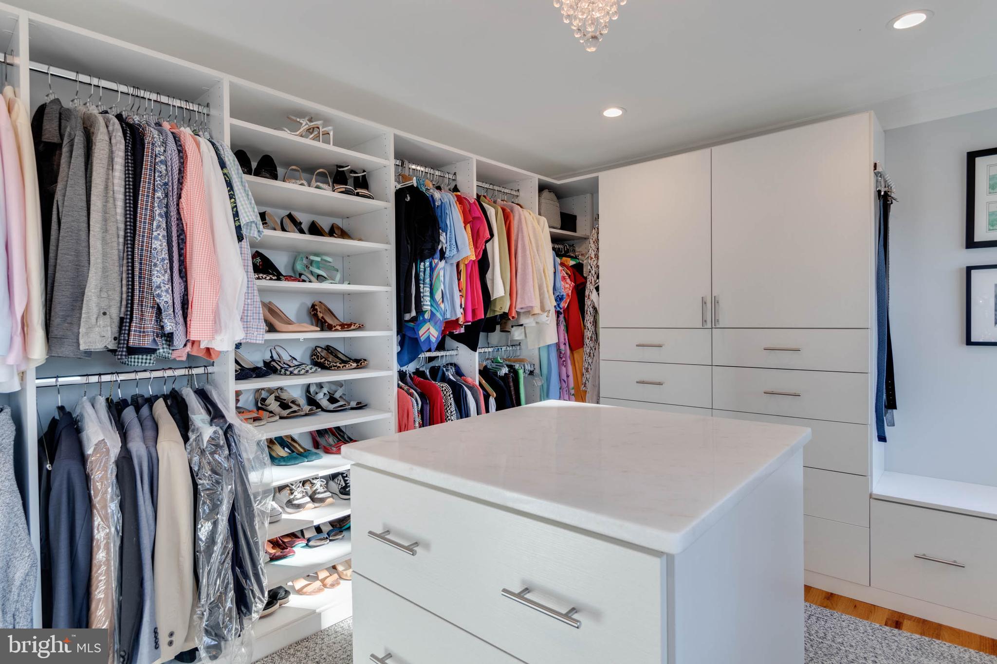 1007 St Stephens Road Alexandria, VA 22304 - Photo 36 of 59 a view of walk in closet with clothes and shoes