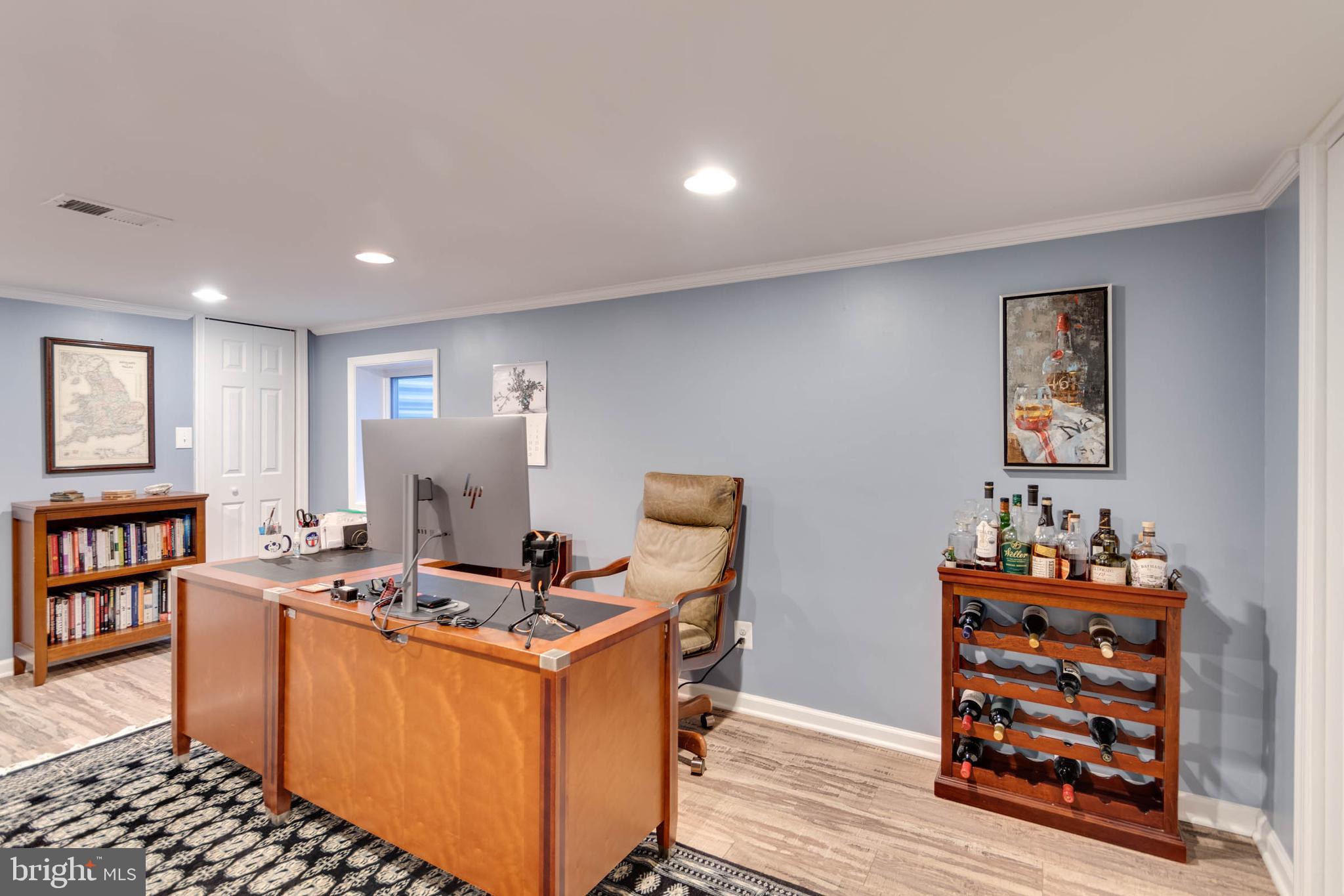 1007 St Stephens Road Alexandria, VA 22304 - Photo 56 of 59 a room with furniture a rug and a window