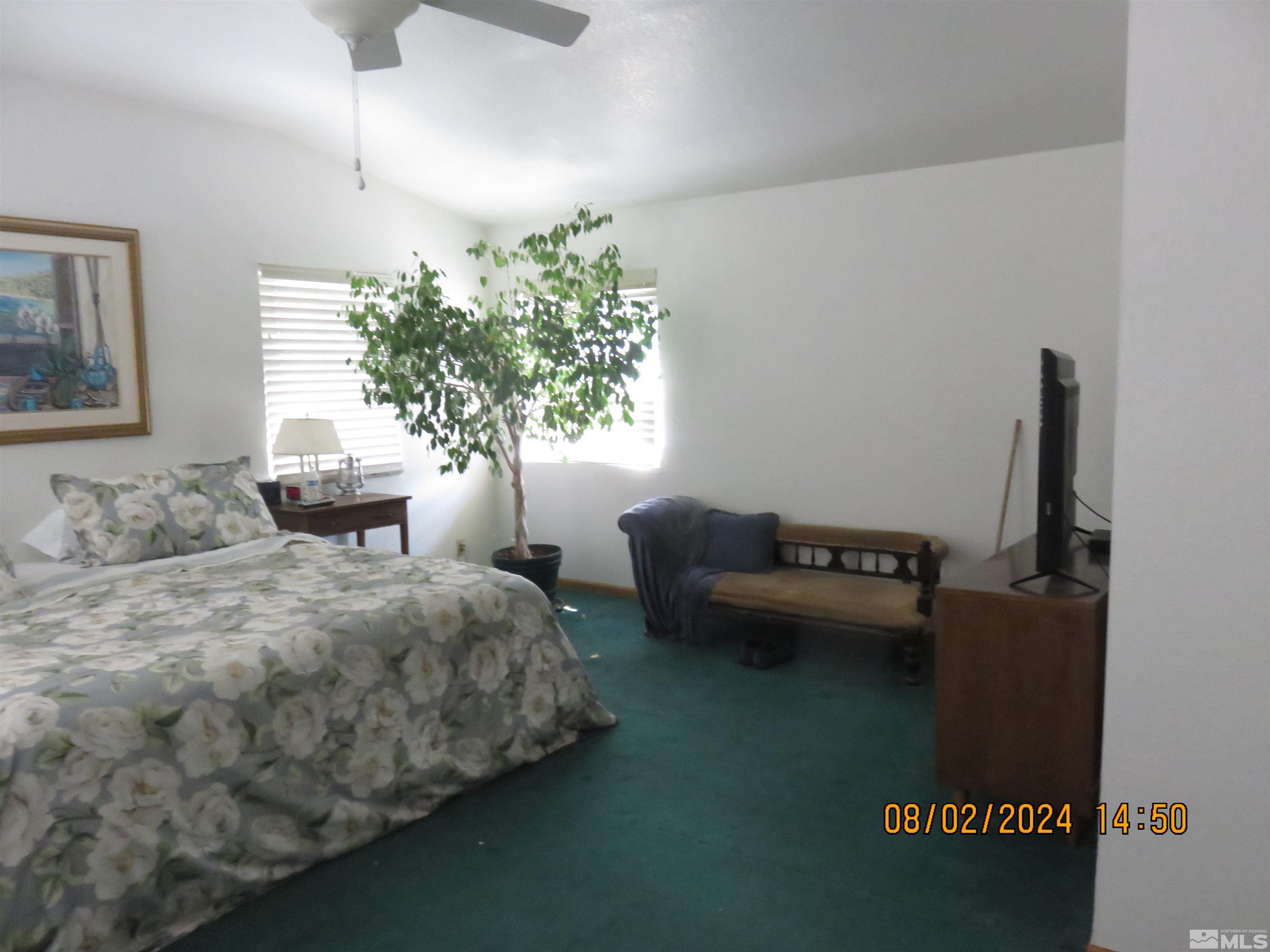 7131 Lighthouse Lane Reno, NV 89511 - Photo 10 of 11 a bedroom with bed and window