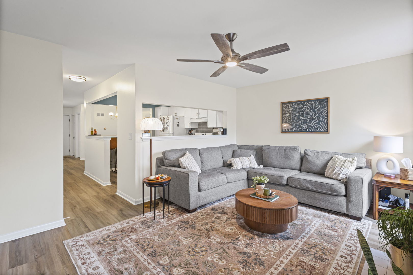111 Cathy Lane Mount Prospect, IL 60056 - Photo 12 of 36 a living room with furniture and a rug