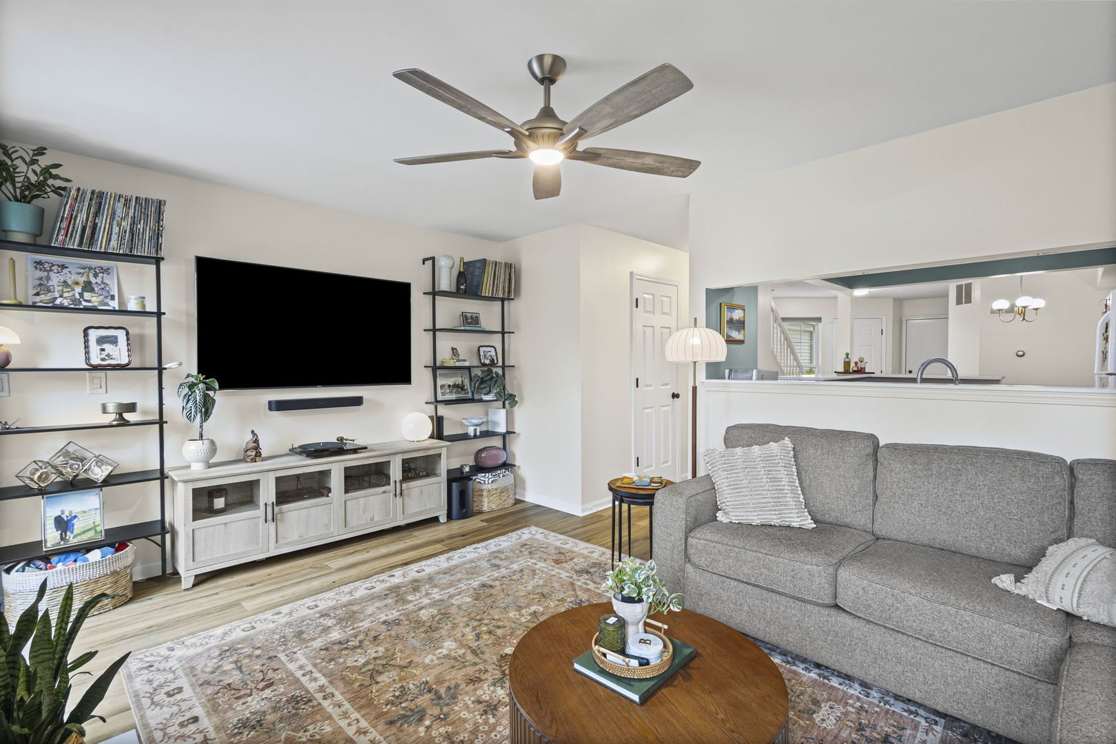 111 Cathy Lane Mount Prospect, IL 60056 - Photo 13 of 36 a living room with furniture and a flat screen tv