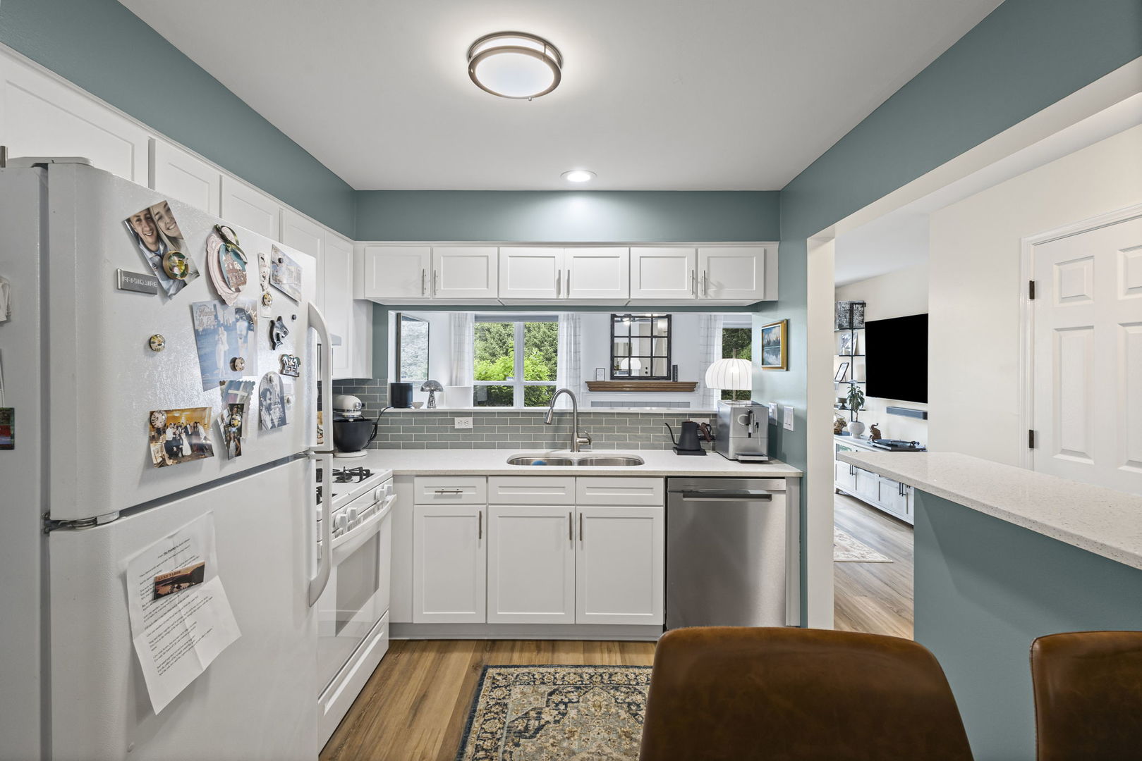 111 Cathy Lane Mount Prospect, IL 60056 - Photo 8 of 36 a kitchen with cabinets and stainless steel appliances