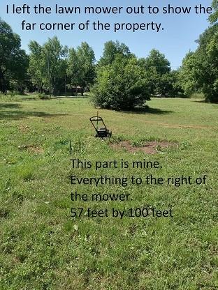 207 South 5th Street Bonham, TX 75418 - Photo 5 of 14 a view of a field with a tree in it