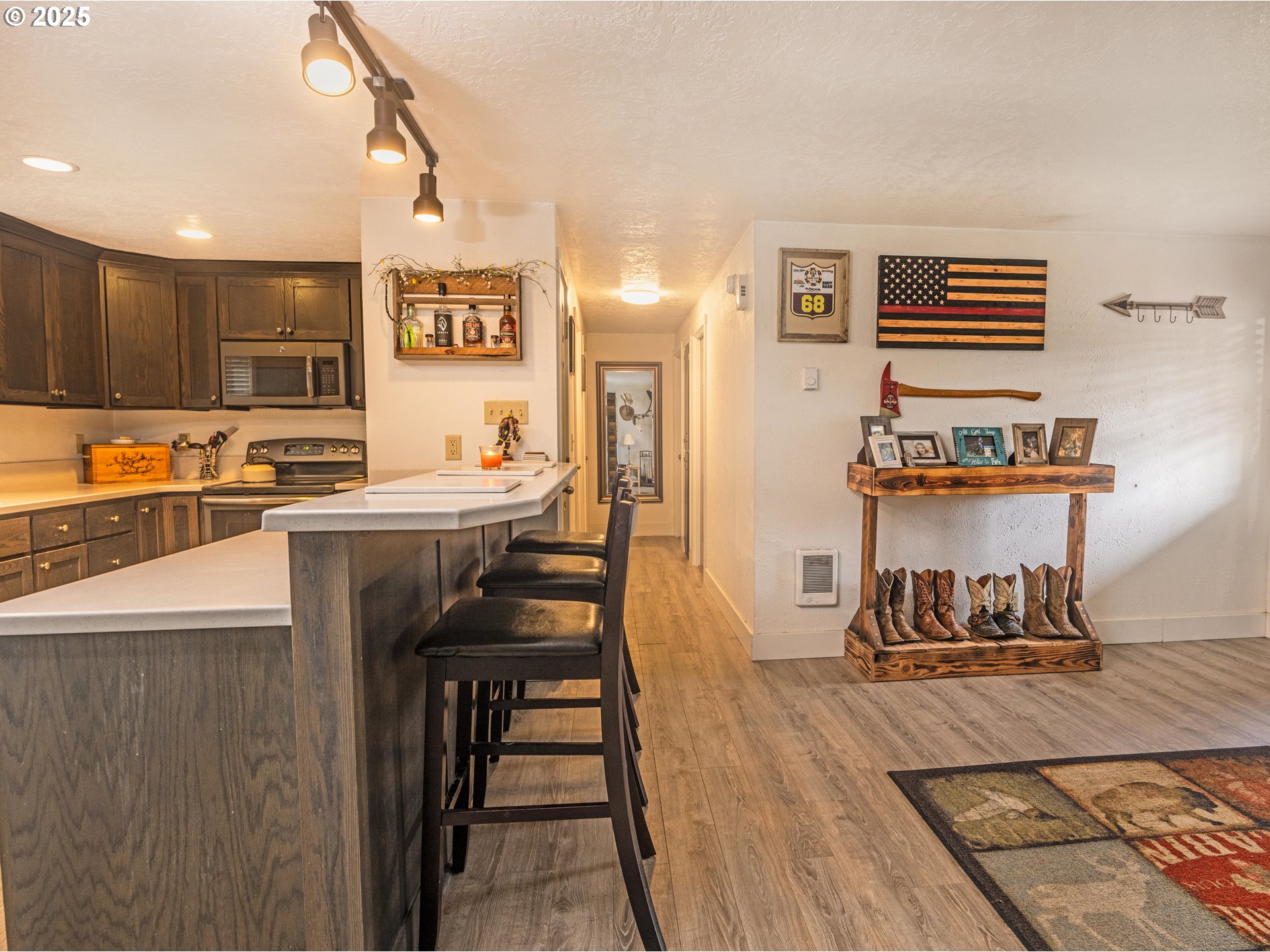824 56th Street Springfield, OR 97478 - Photo 12 of 31 a view of a dining room with furniture and wooden floor