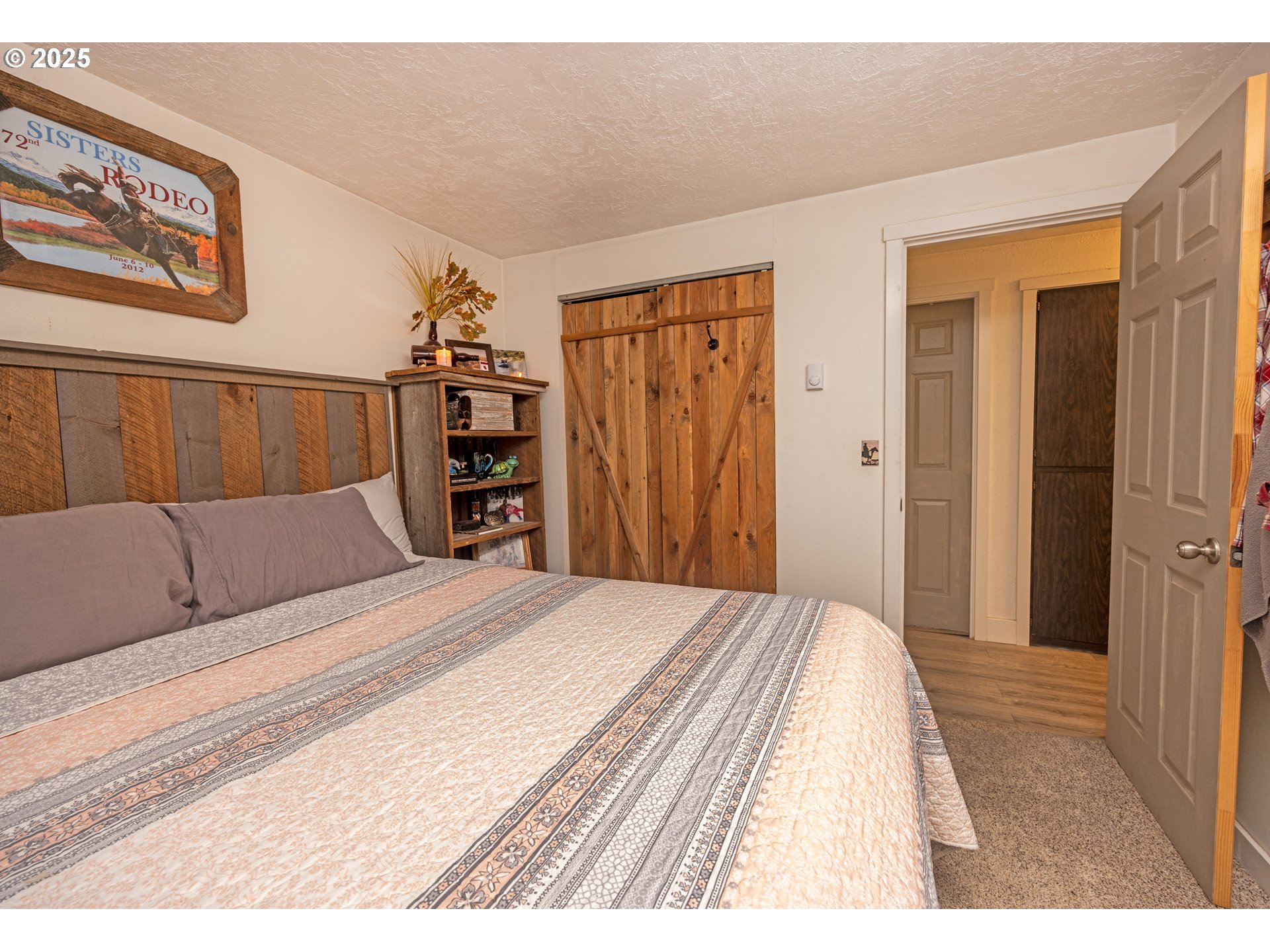 824 56th Street Springfield, OR 97478 - Photo 13 of 31 a bedroom with a large bed and a closet
